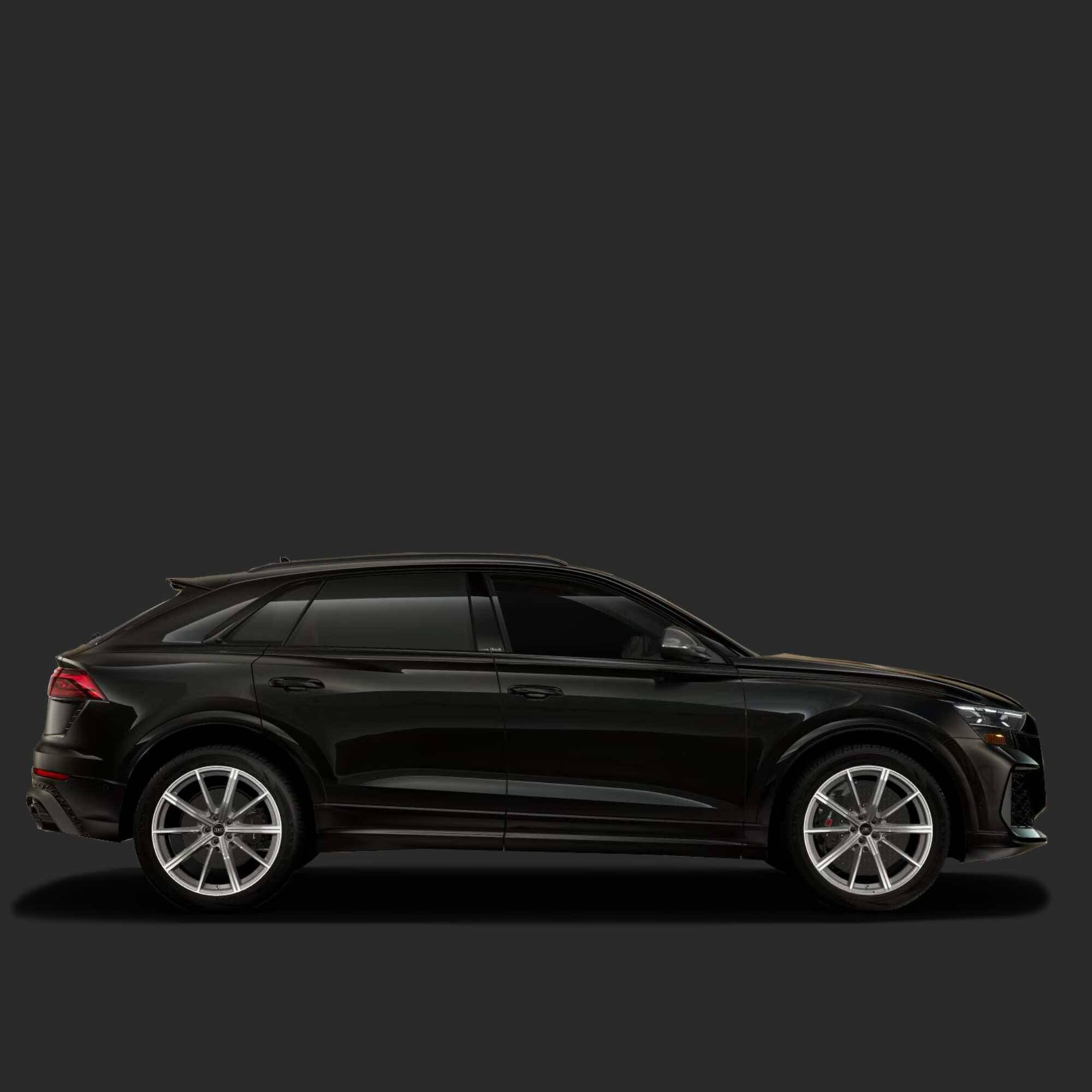 Black SUV on a dark gray background