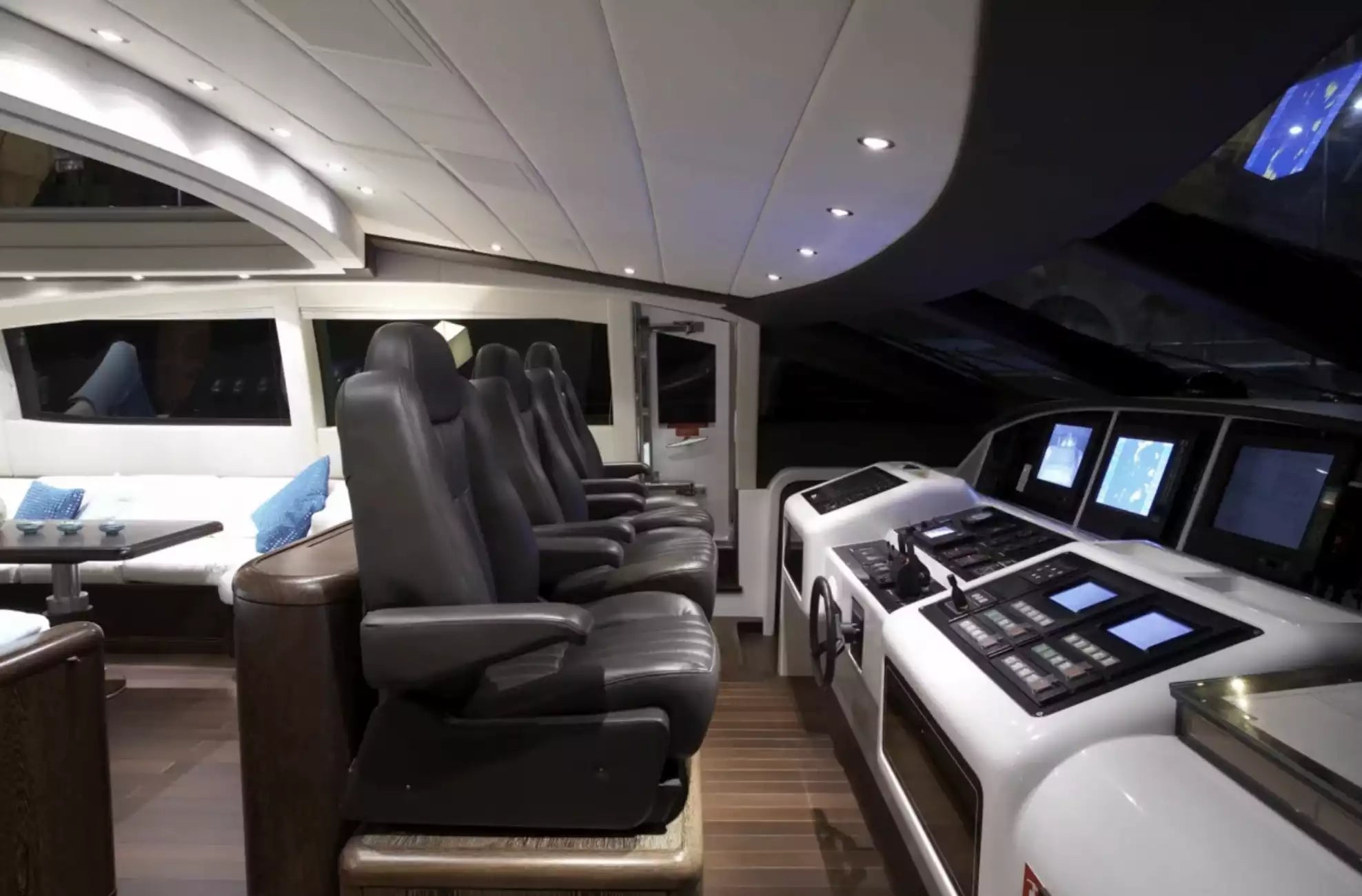 Luxury interior of a vehicle with leather seats and modern controls.