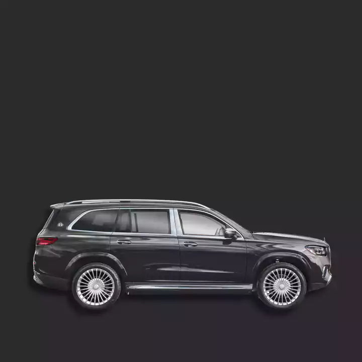 Side view of a black SUV on a dark background