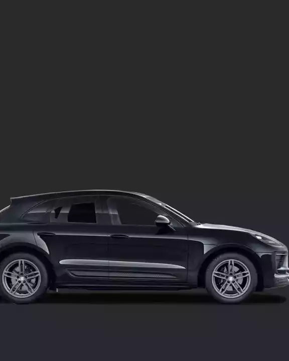 Side view of a black SUV on a dark background