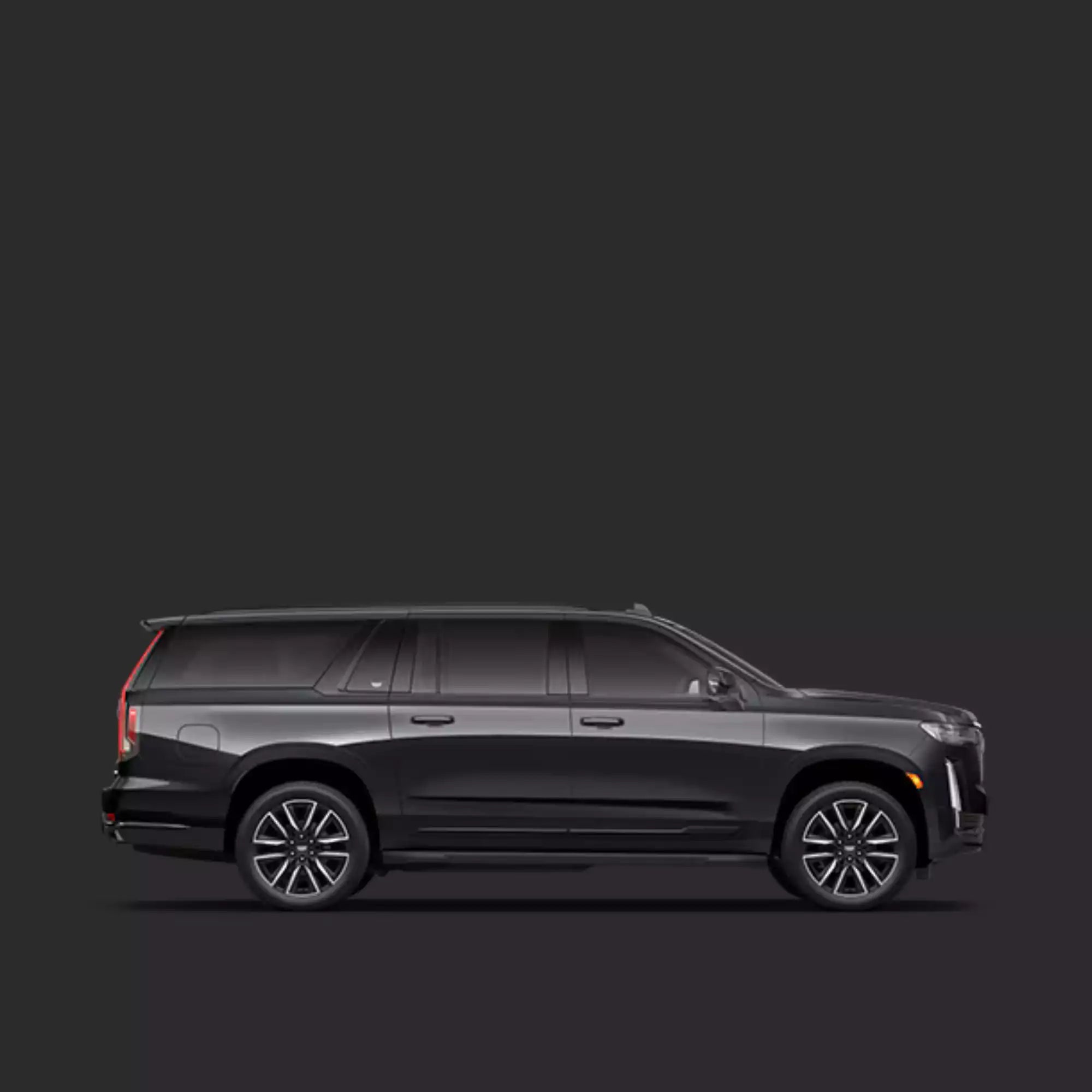 Black SUV on a dark gray background