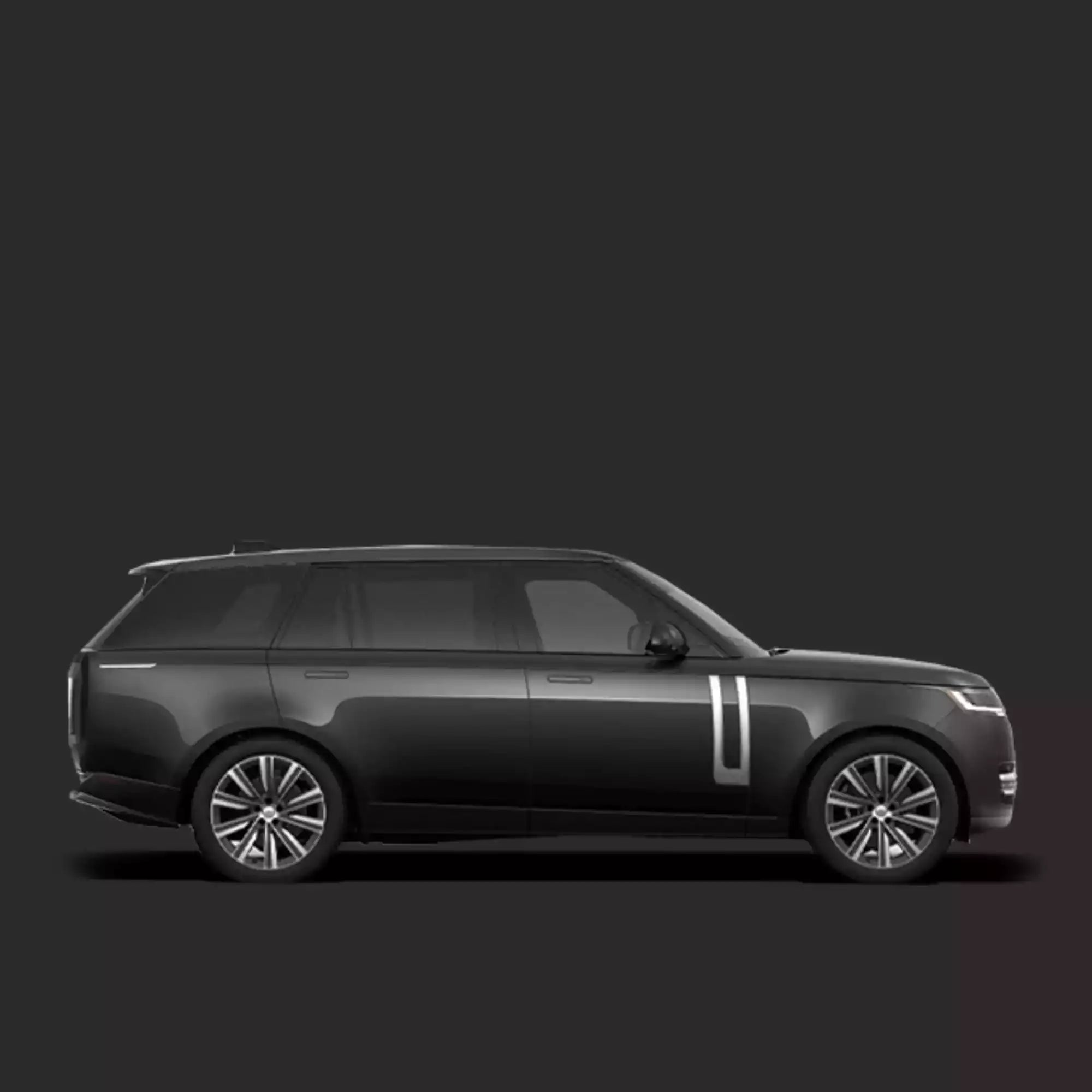 Side view of a black luxury SUV on a dark background