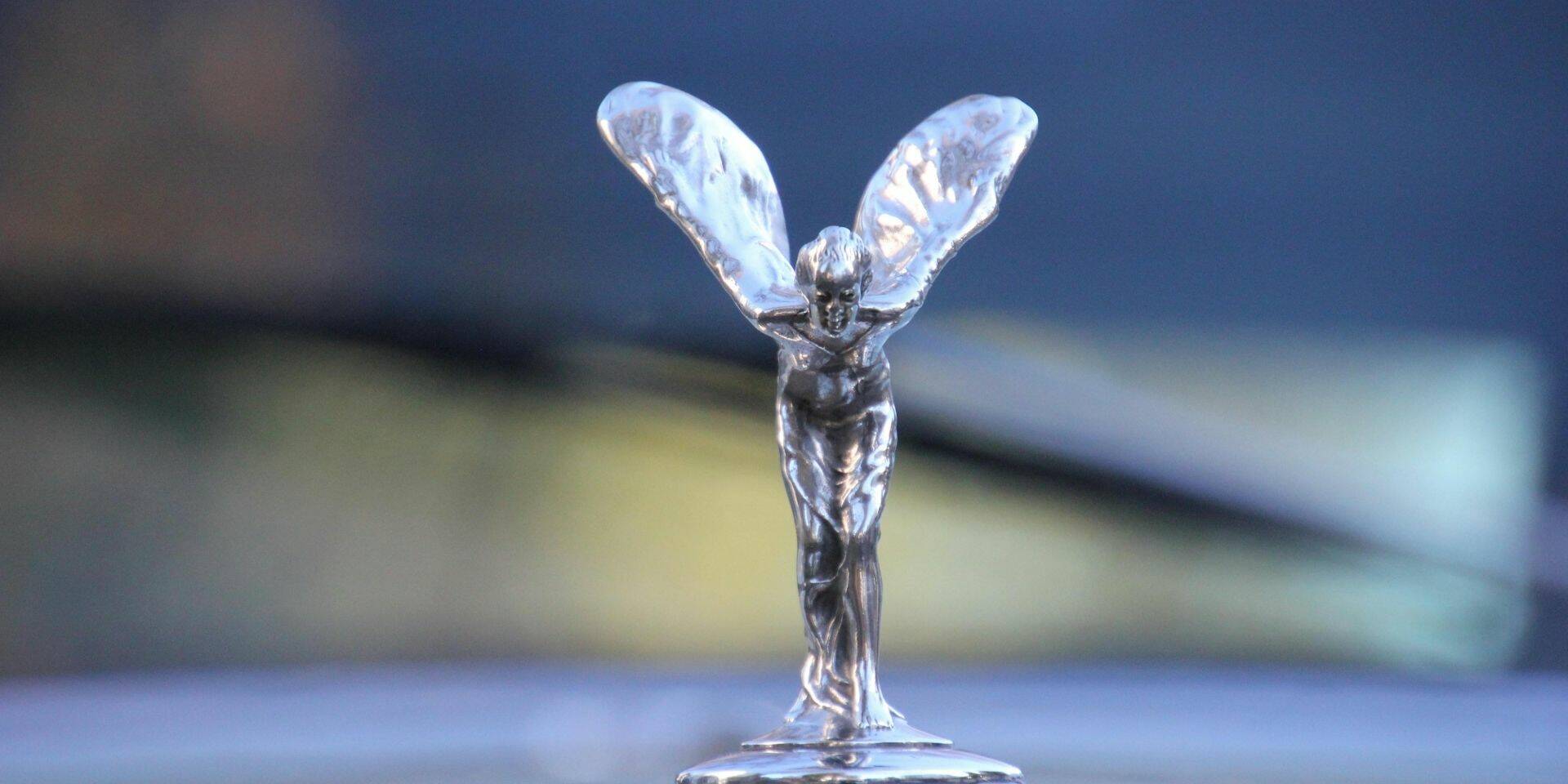 Rolls-Royce car emblem with a blurred background