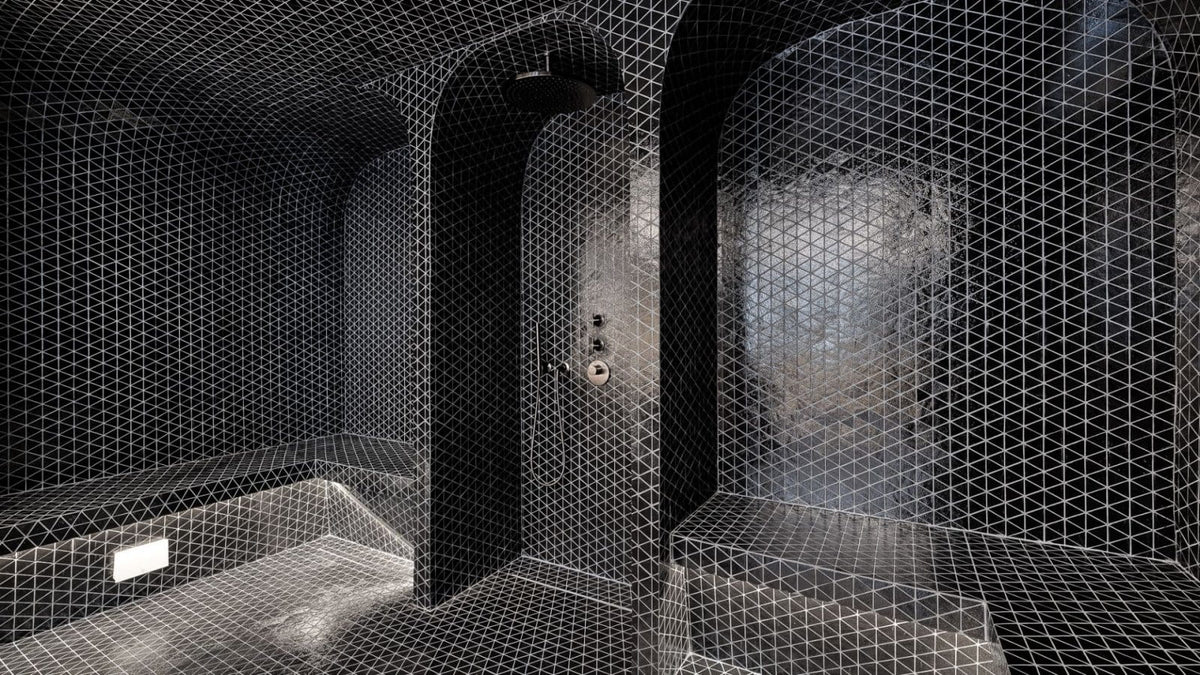 A dark, modern interior space with arched alcoves and walls covered in a black-and-white geometric wire-grid pattern, resembling a sculptural architectural rendering or design concept.