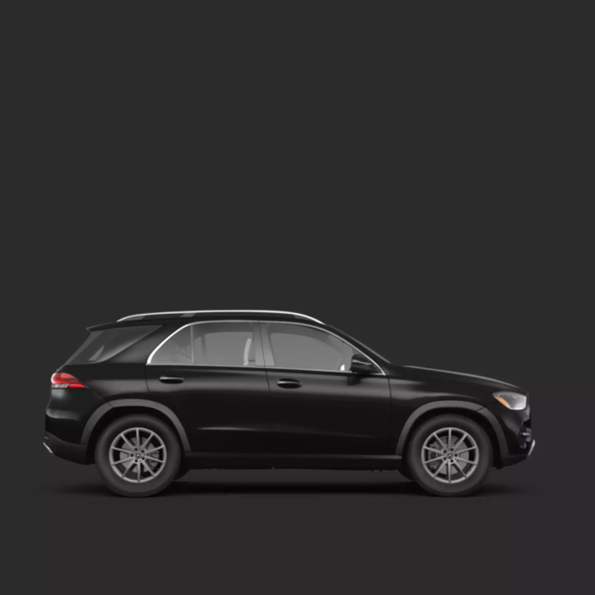 A black Mercedes-Benz GLE SUV shown from a side profile view against a dark gray studio background.