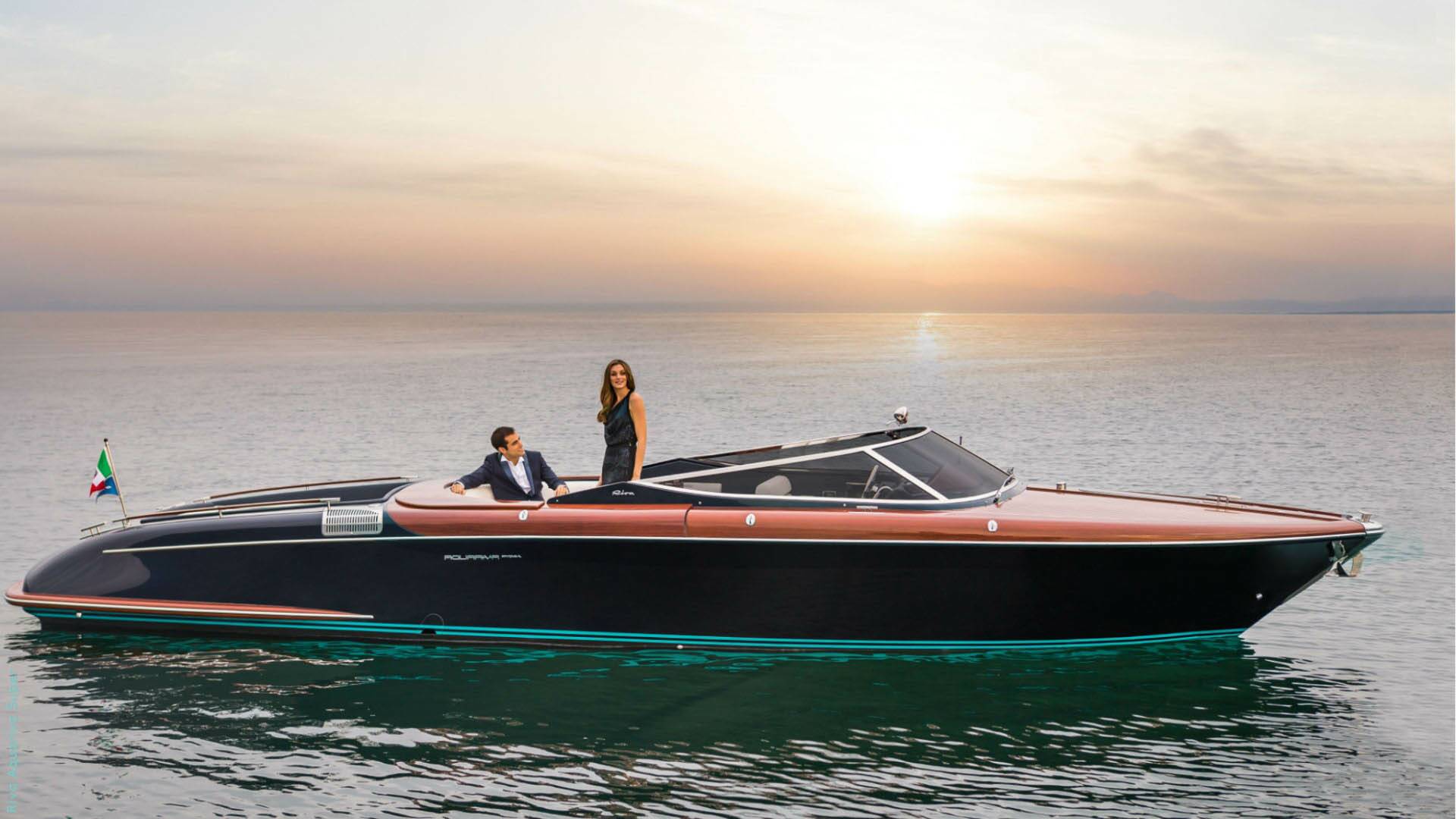 Luxury boat on the water with a sunset in the background