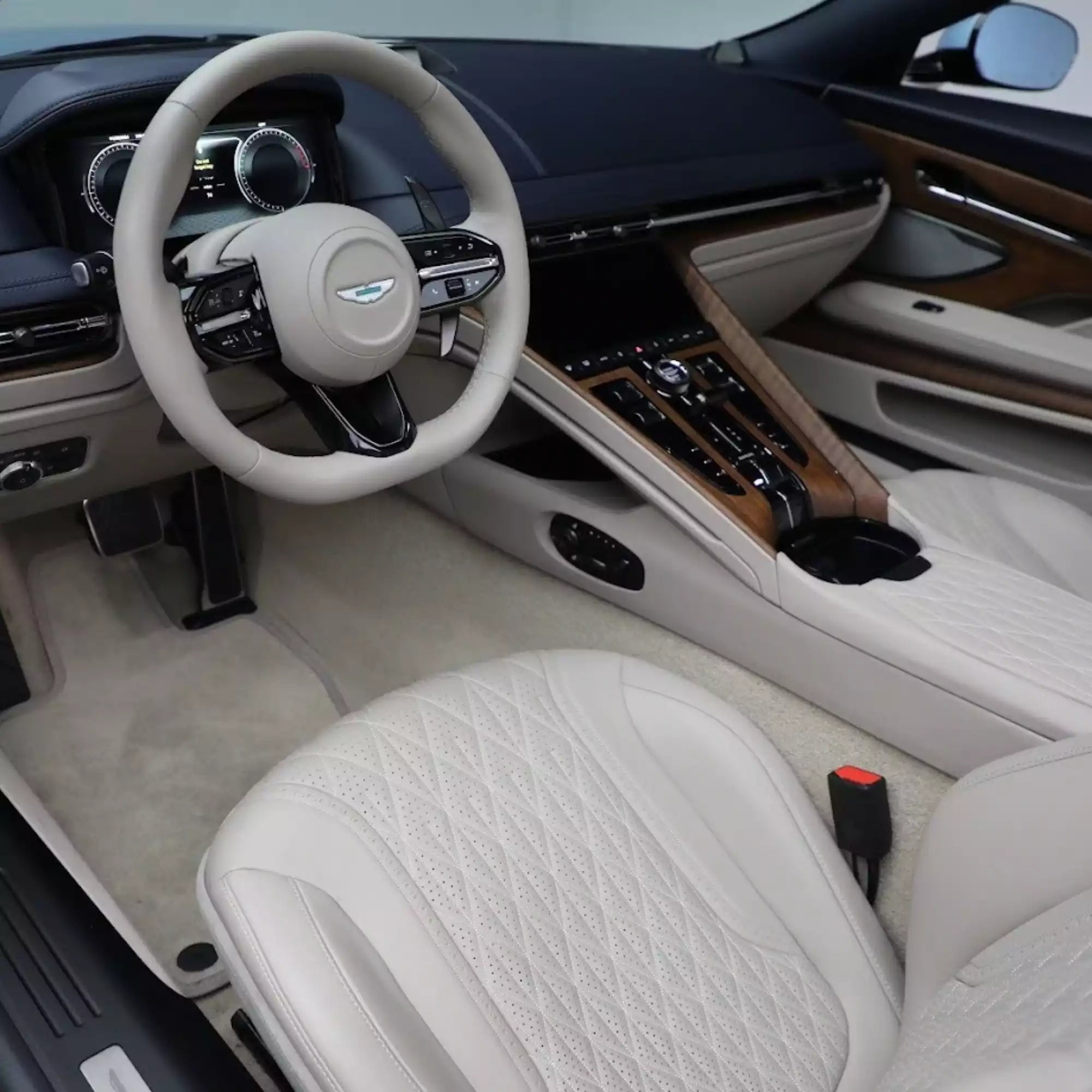Luxury car interior with steering wheel and dashboard