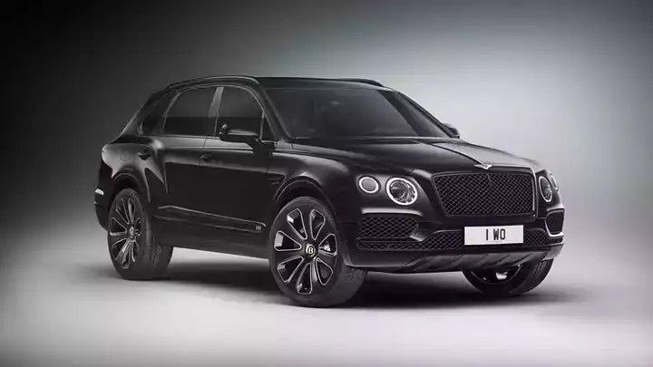 Black Bentley SUV on a gray background