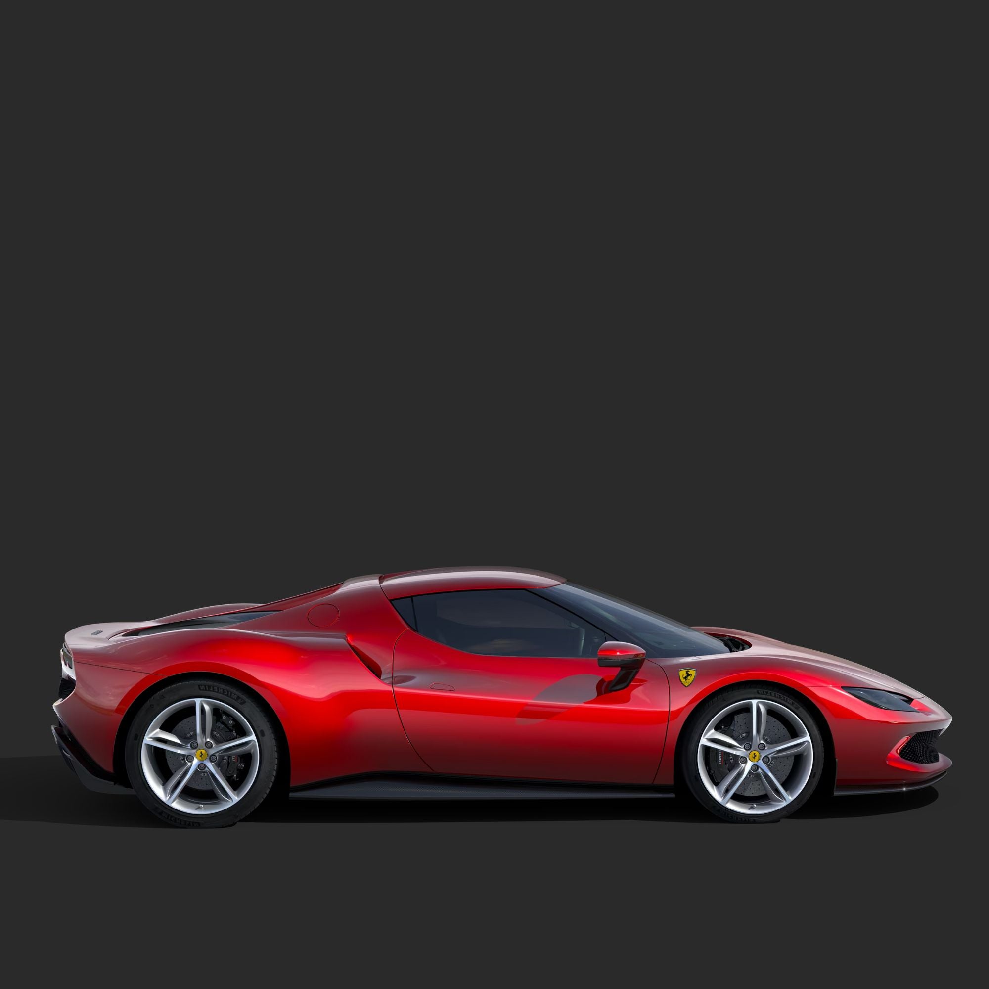 Red Ferrari sports car on a dark background