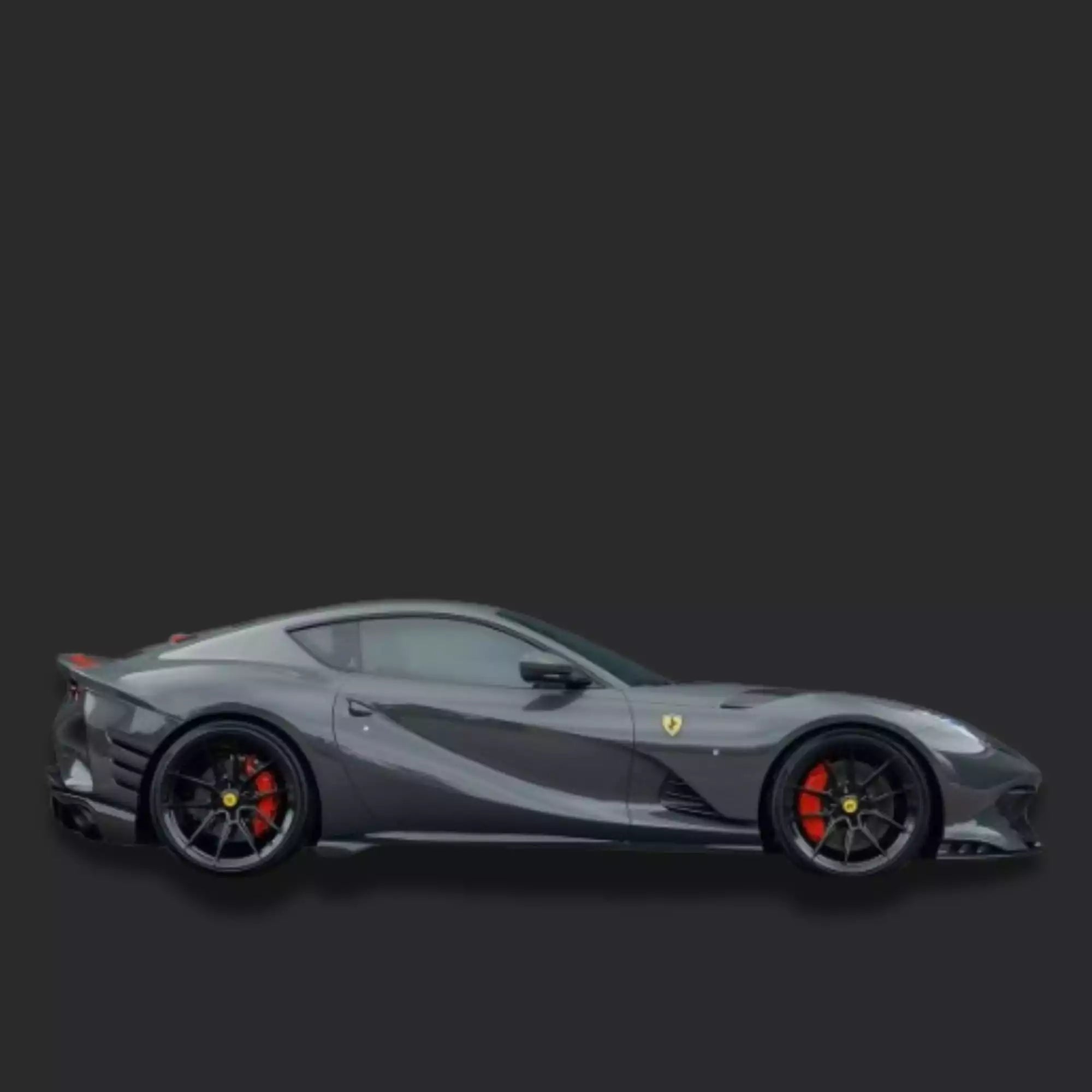 Gray Ferrari sports car on a black background