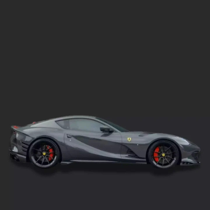 Gray Ferrari sports car on a black background