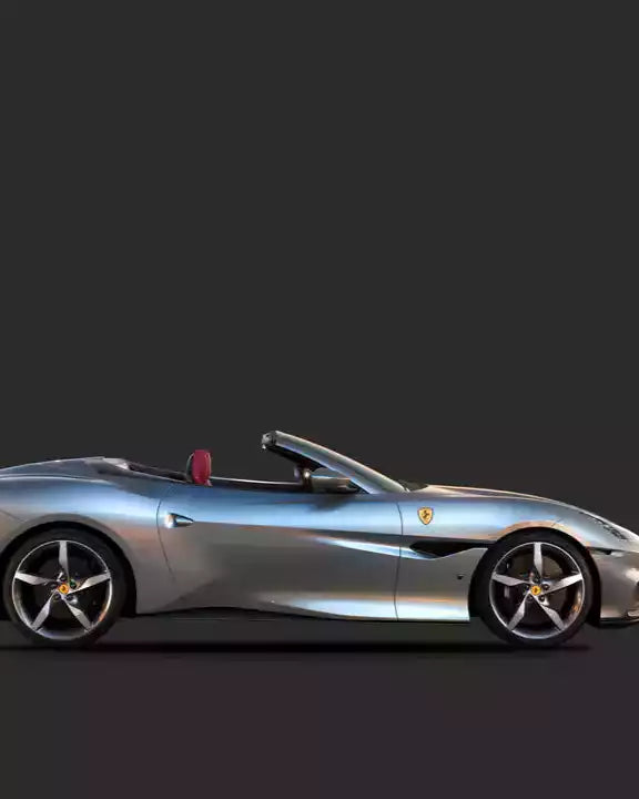 Silver Ferrari sports car on a dark background