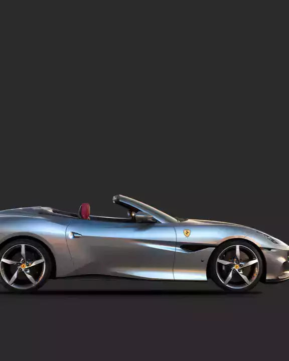 Silver Ferrari sports car on a black background