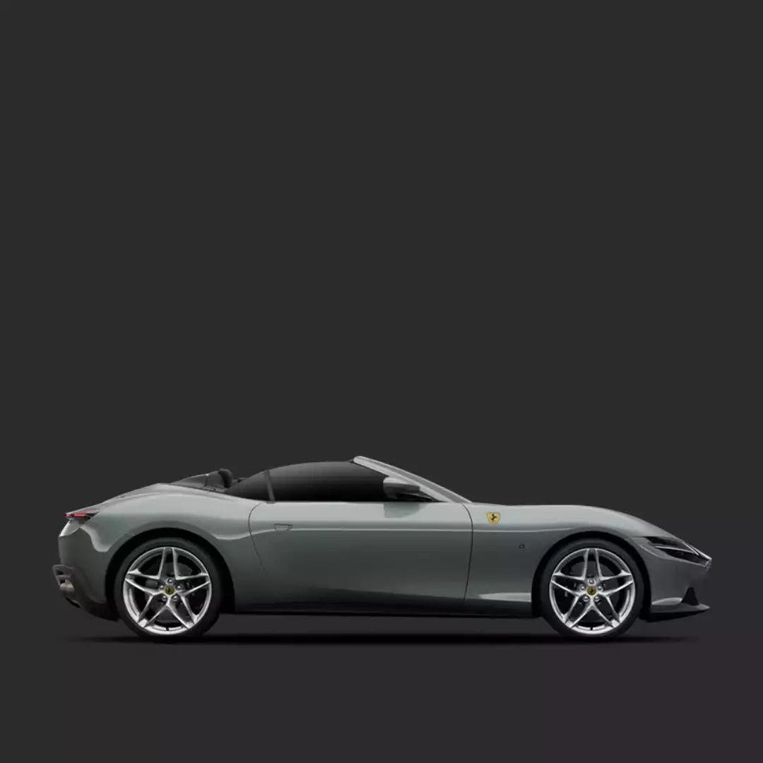 Gray Ferrari sports car on a black background