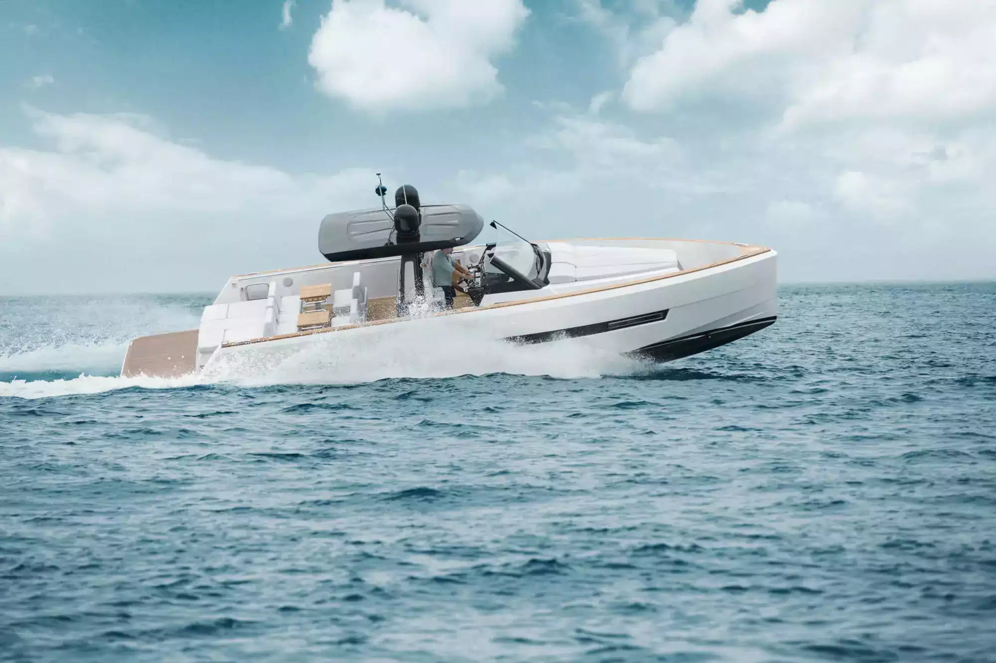 White speedboat on the water with a clear sky background