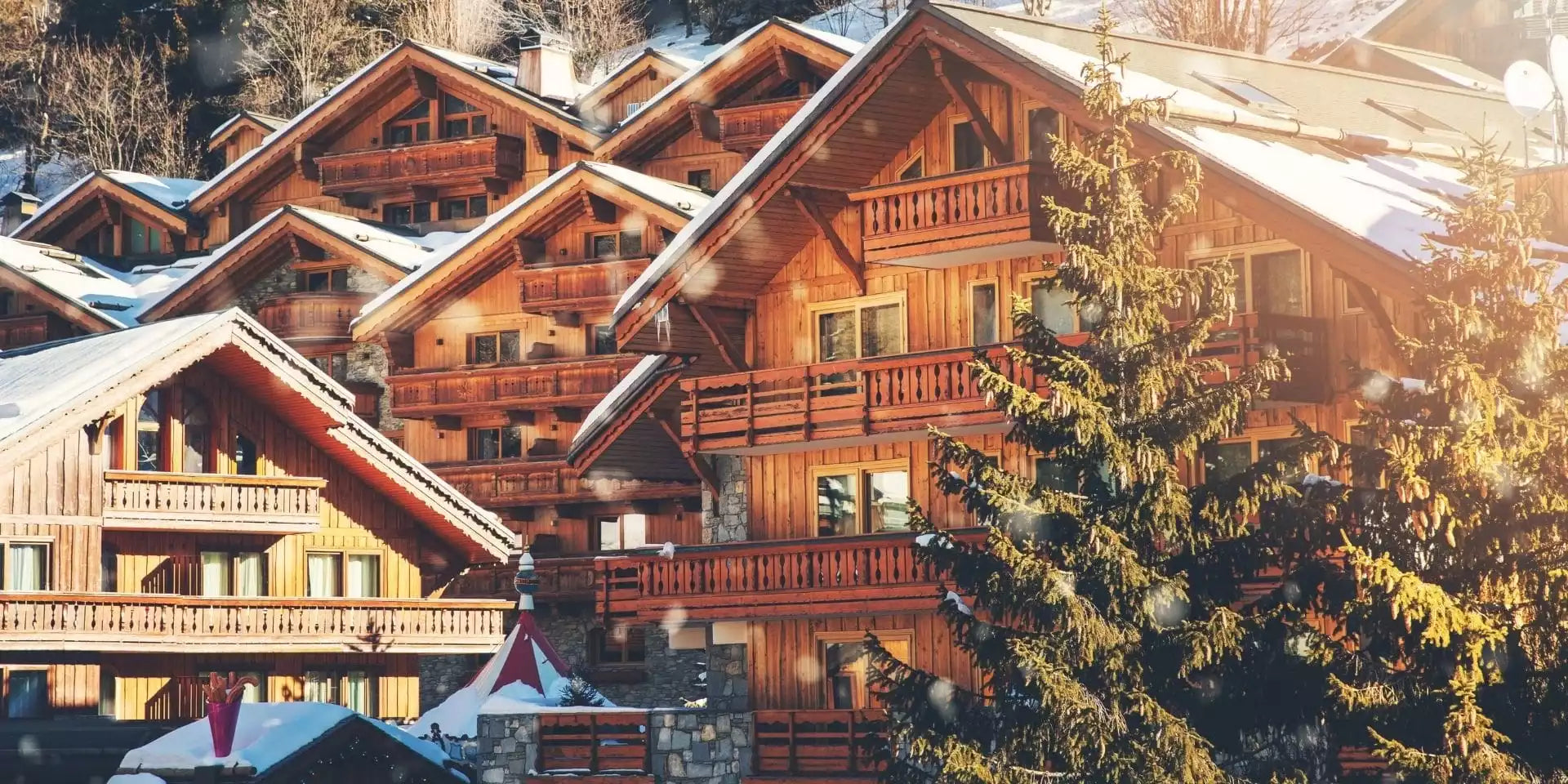 Wooden chalets with balconies in a mountainous area
