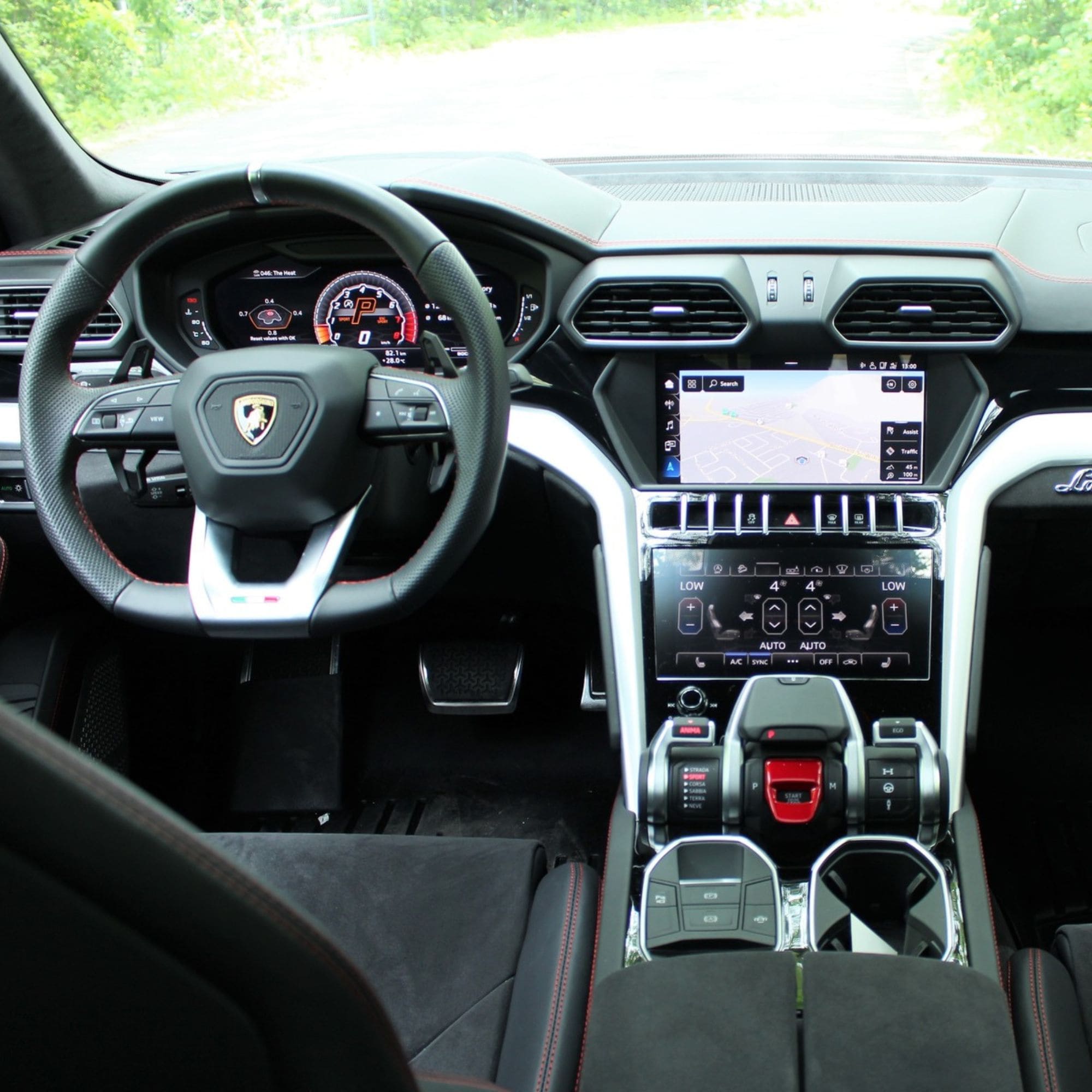 Luxury car interior with steering wheel and dashboard