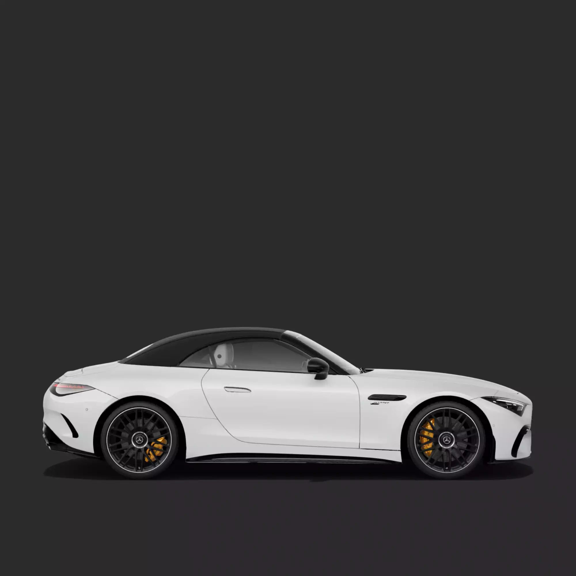 A white convertible sports car shown in a clean side profile against a dark gray studio background. The vehicle features black wheels with visible yellow brake calipers and a black soft top.