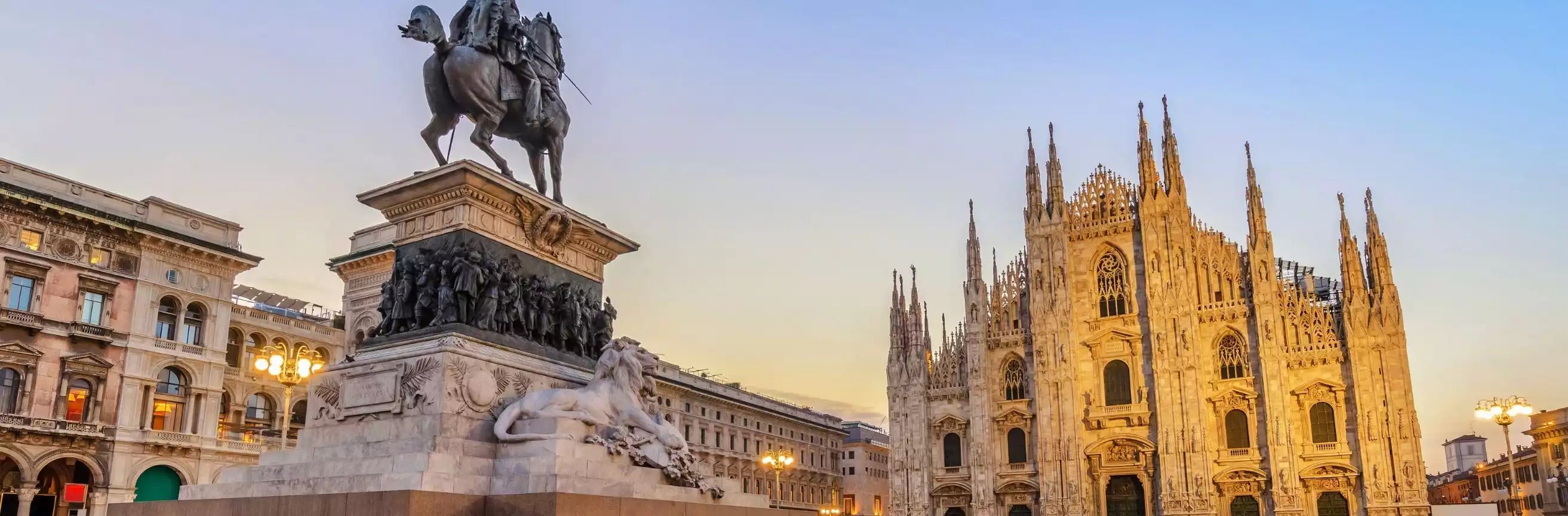 Statue of a horse and rider in front of the Duomo di Milano, Milan, Italy