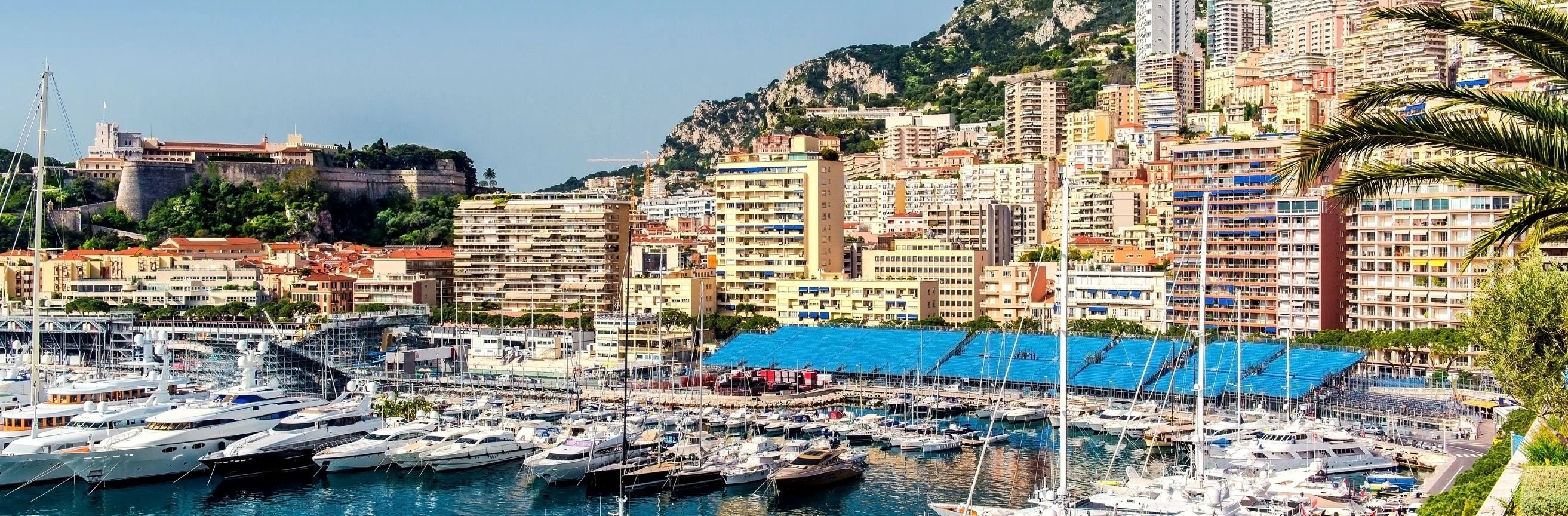 Marina with yachts and buildings in a coastal city