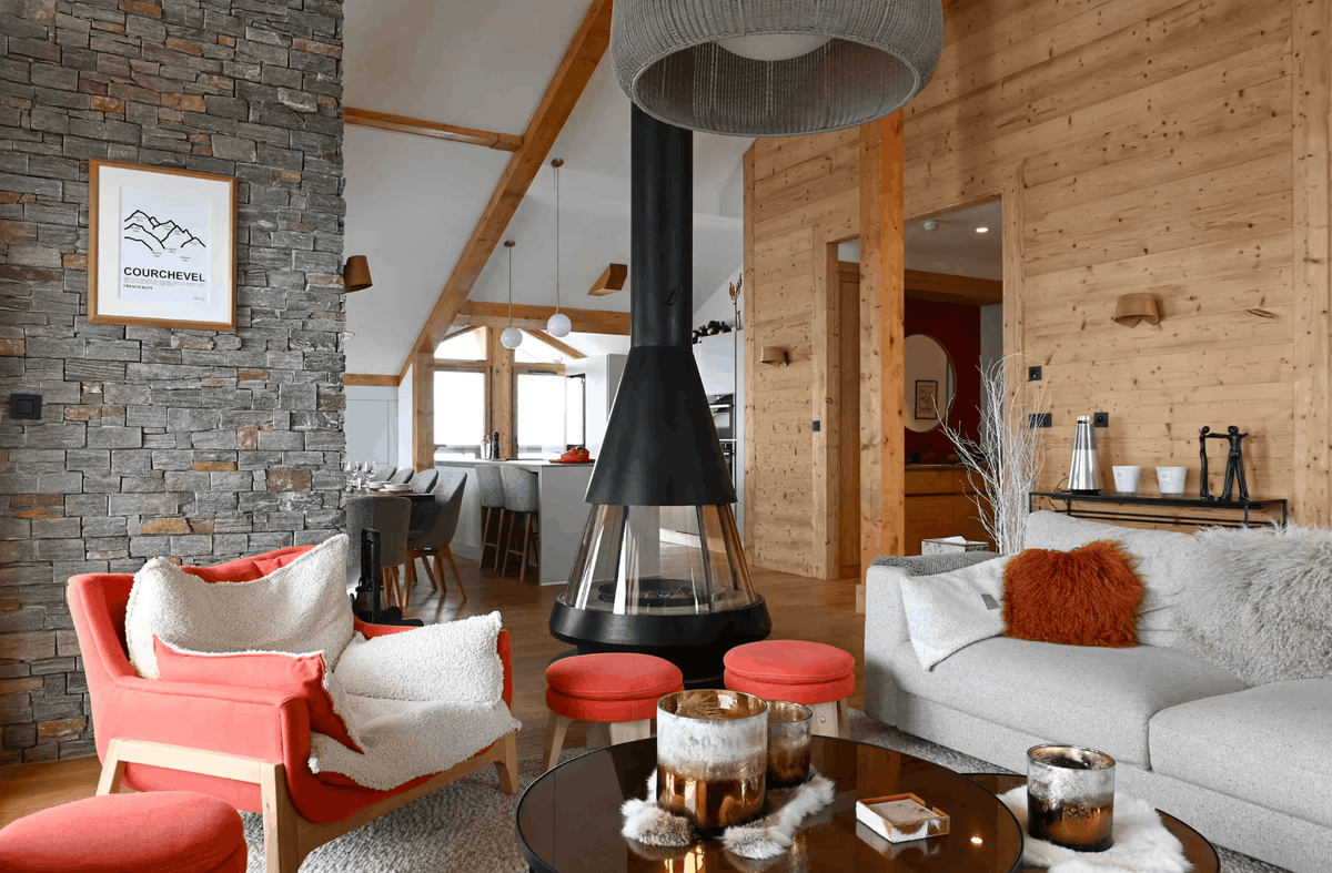 Luxury living room with fireplace at Penthouse Belladone in Courchevel Moriond