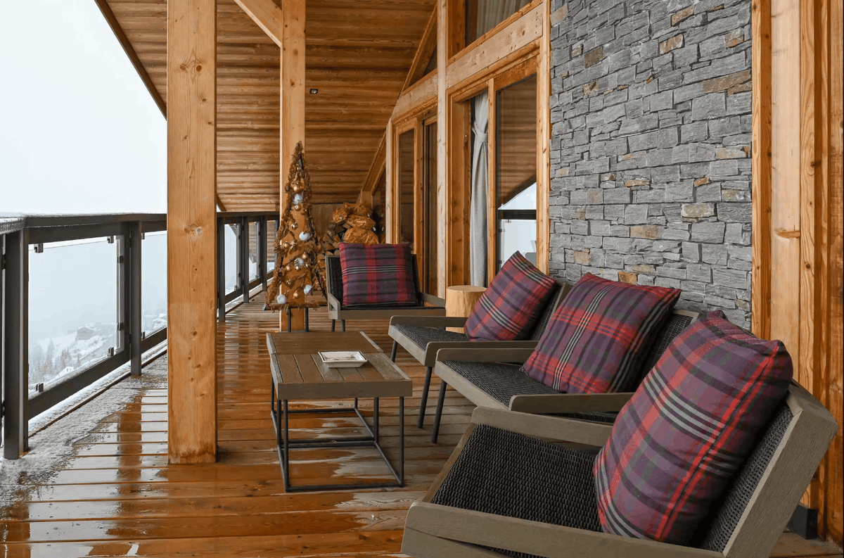 Panoramic balcony overlooking the Alpine scenery from Penthouse Belladone in Courchevel