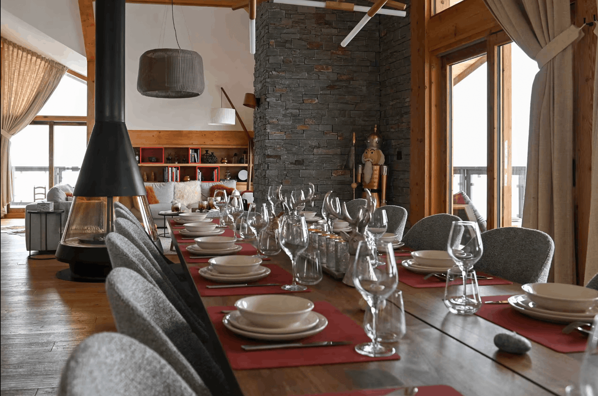 Elegant dining room with a beautifully set table at Penthouse Belladone in Courchevel