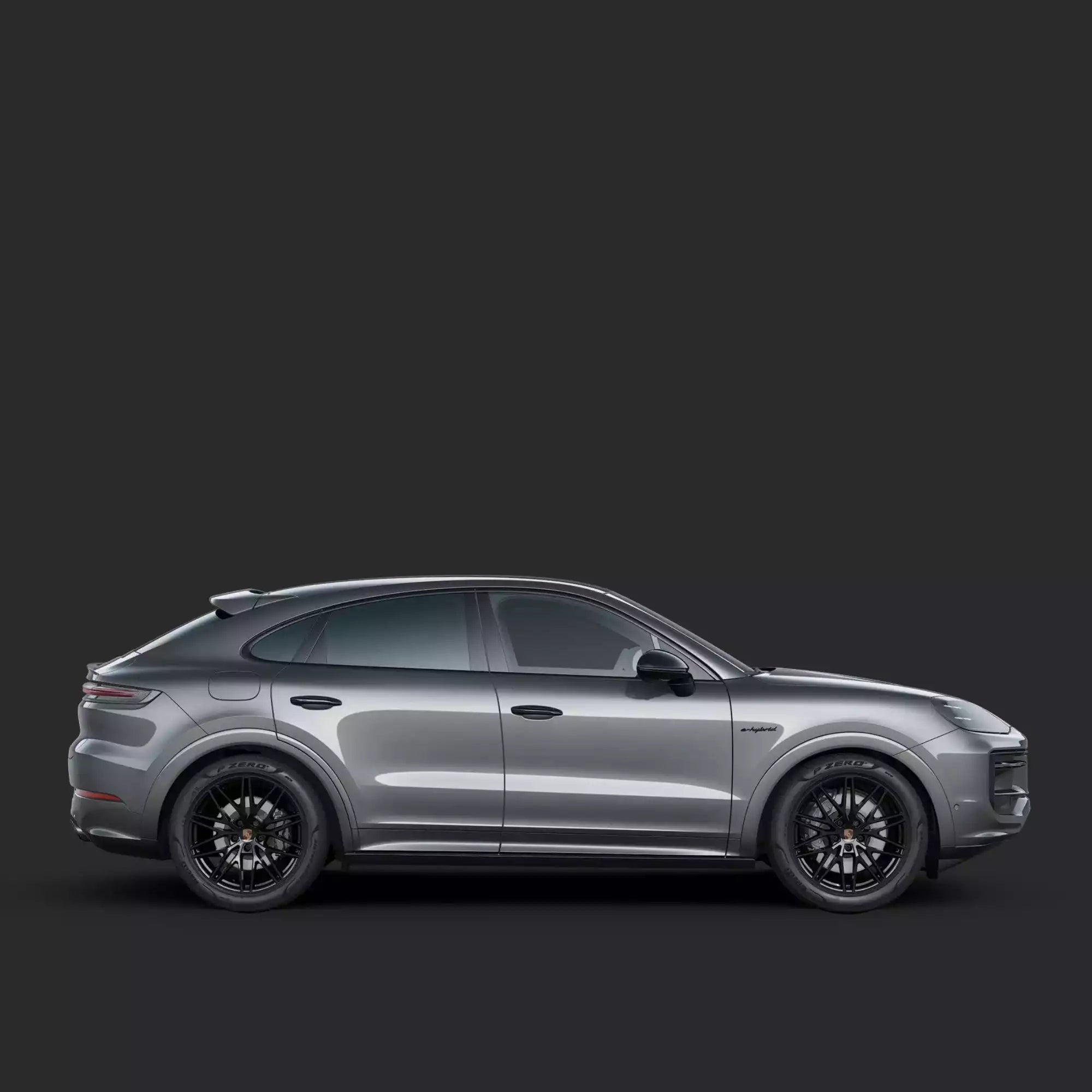 Silver SUV on a black background