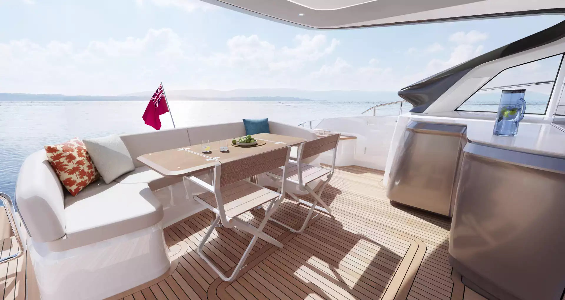 Yacht deck with table, chairs, and cushions on a sunny day.