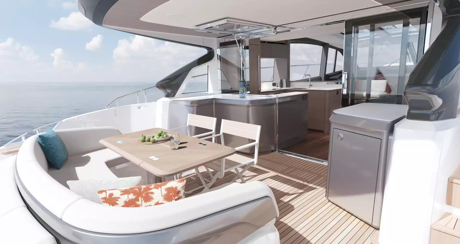 Interior of a luxurious yacht with modern furniture and large windows overlooking the ocean.