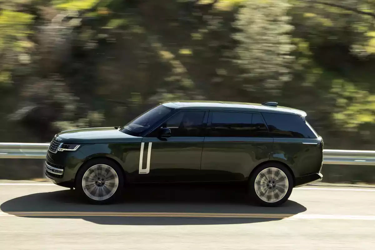 Elegant Range Rover Vogue with private chauffeur for corporate events and airport transfers in Cannes.