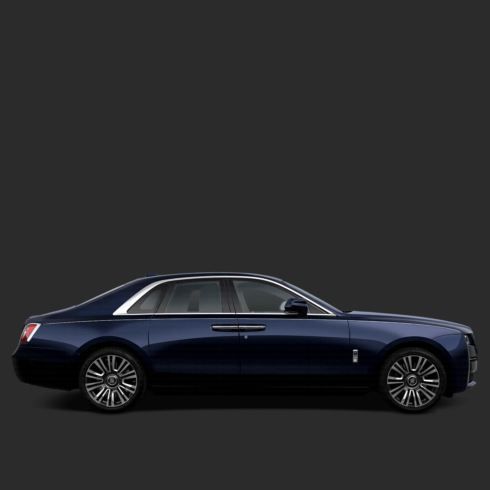 A dark navy blue luxury sedan shown in a clean side profile against a solid dark gray background.