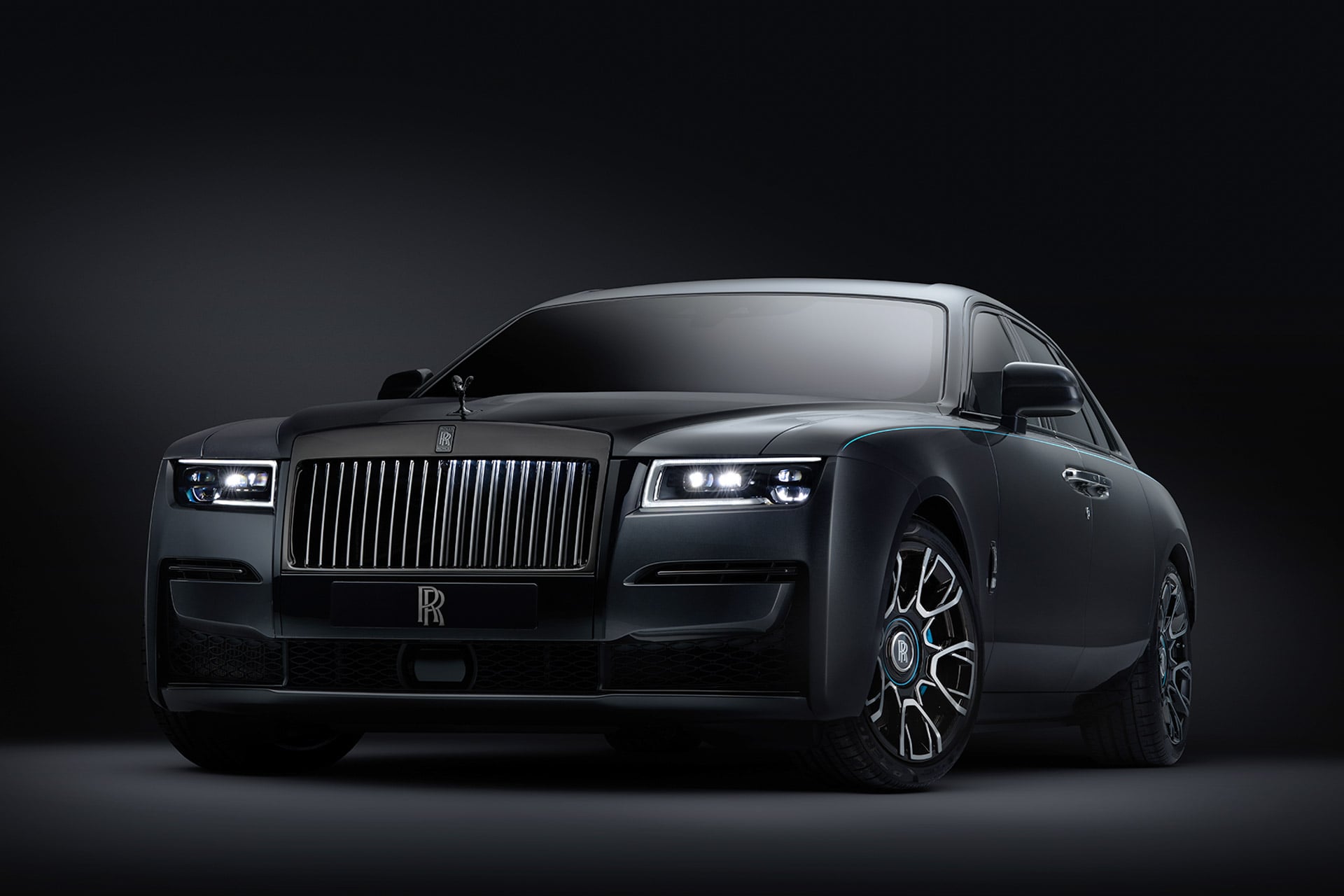 Black Rolls-Royce car on a dark background