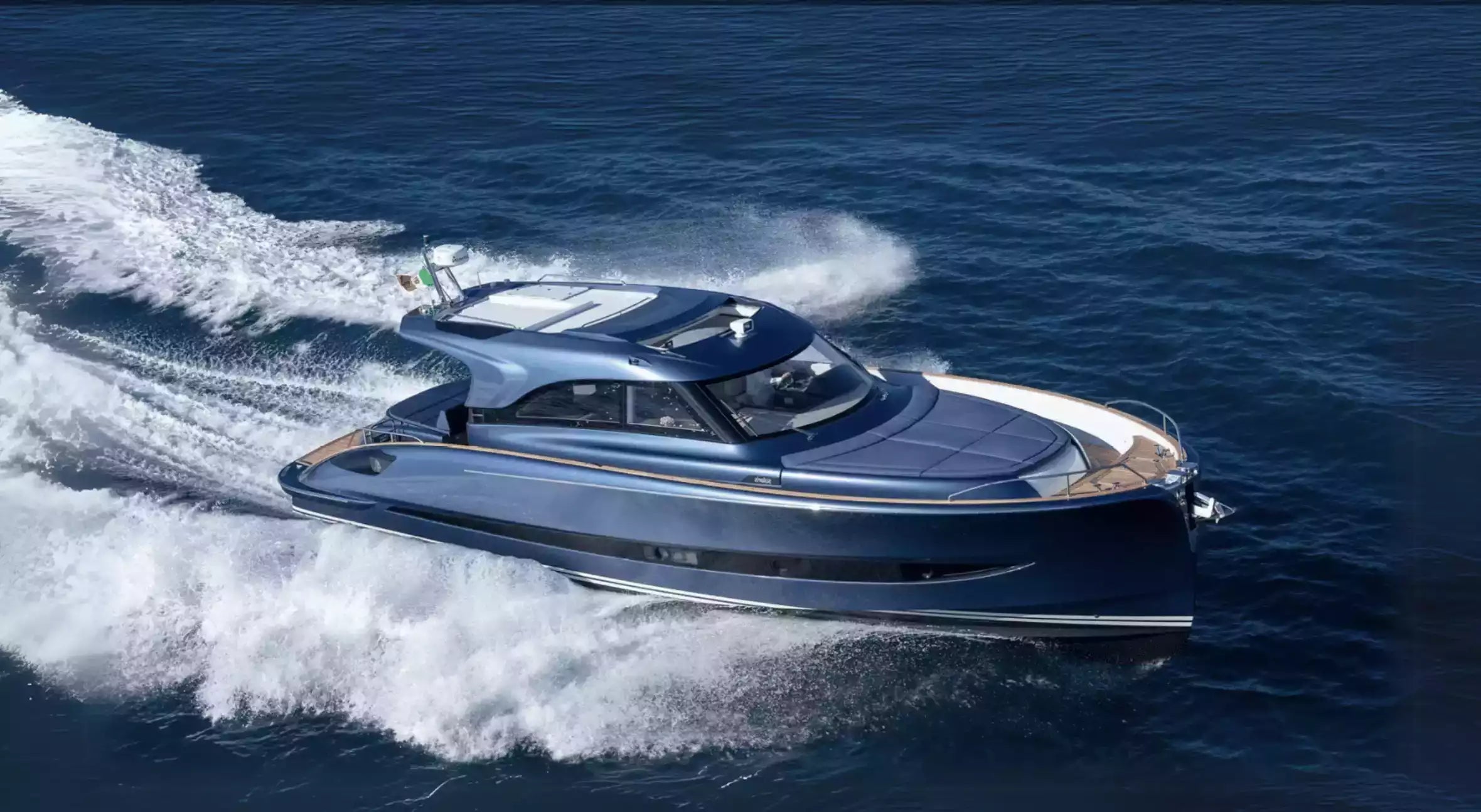 Luxury yacht speeding across the ocean
