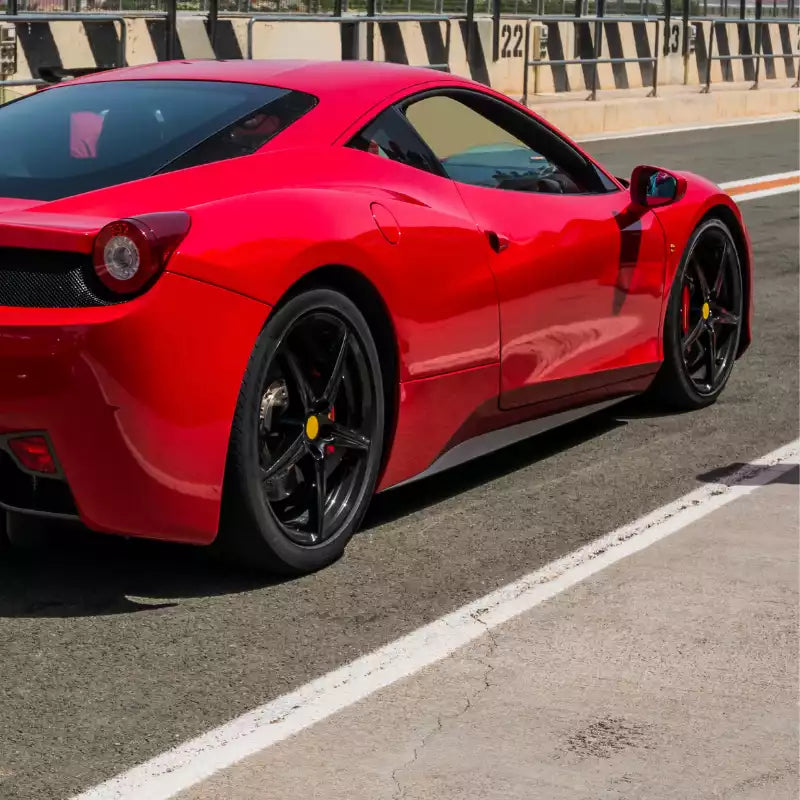 Red sports car on a track