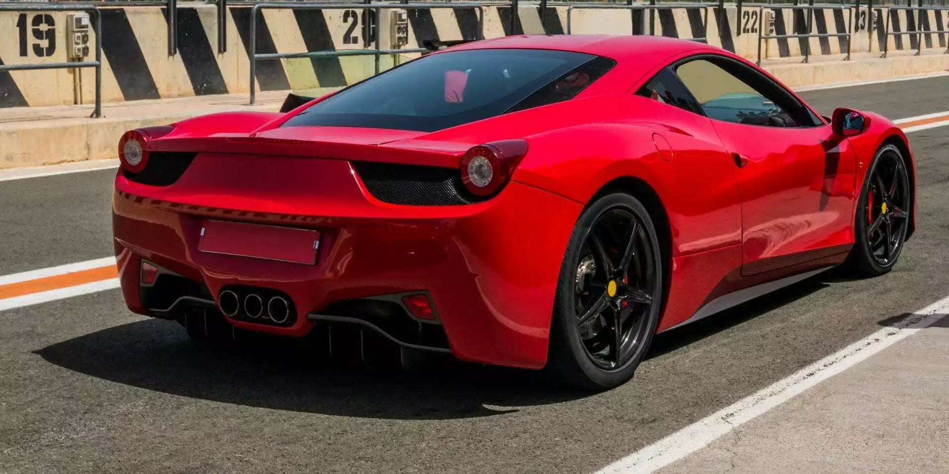 Red sports car on a racetrack