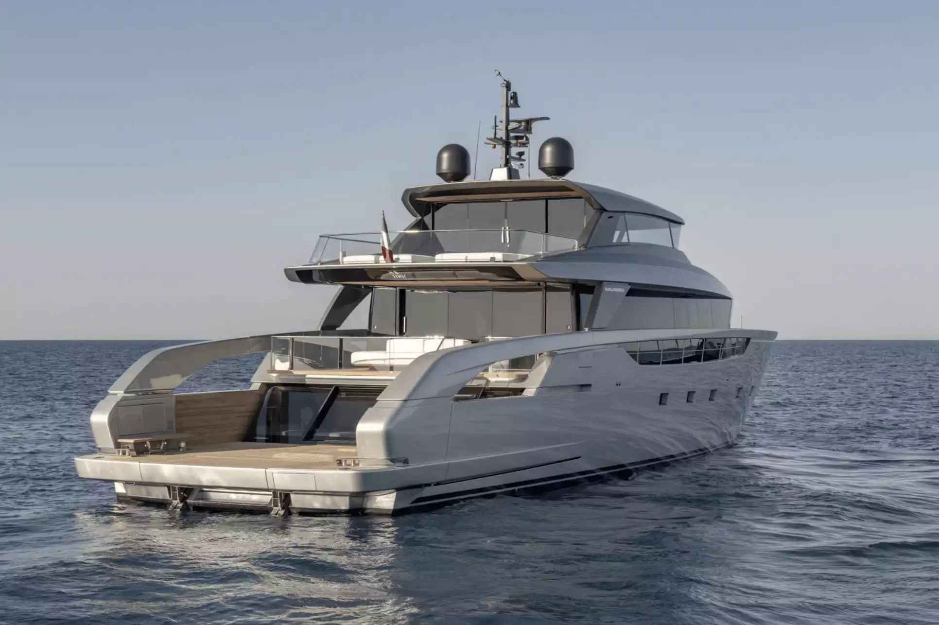 Luxury yacht on the water with a clear sky