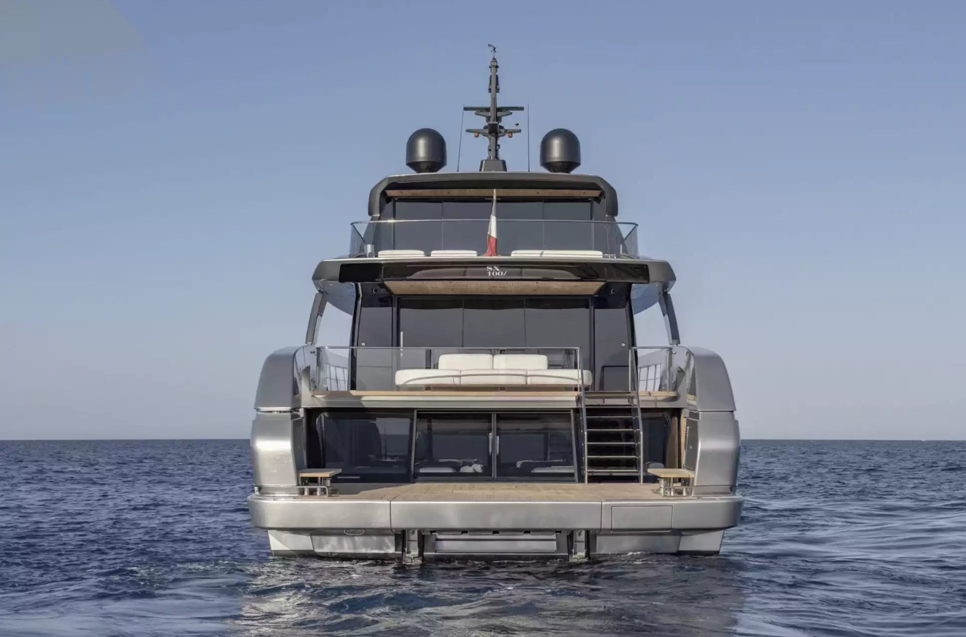 Large yacht on the water with a clear sky
