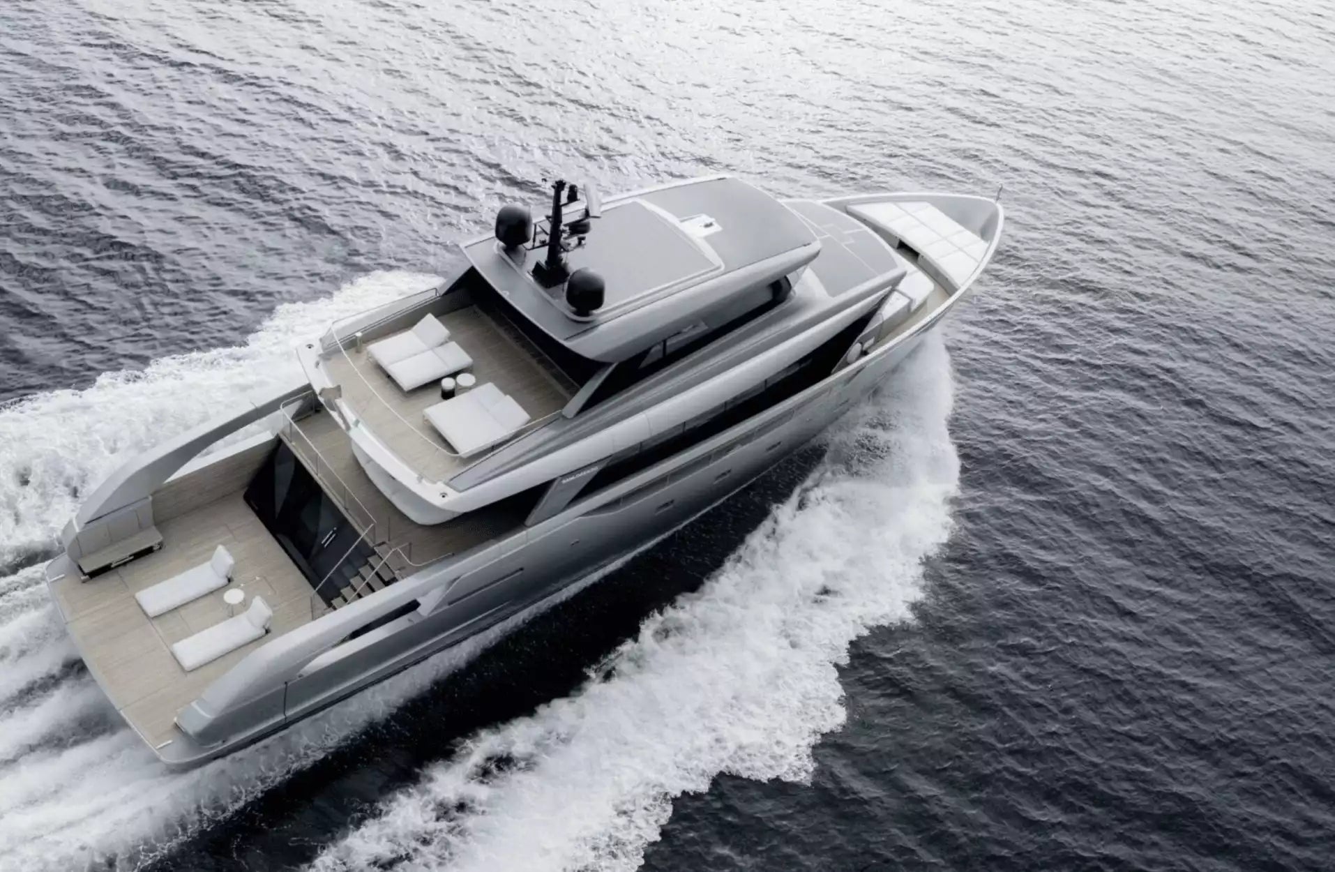 Luxury yacht on the water with a clear sky background