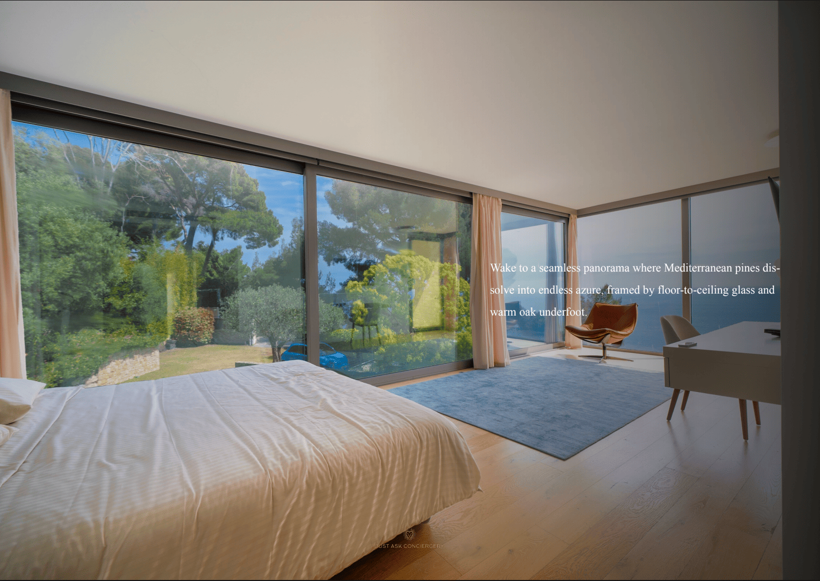 Modern bedroom with large windows offering a view of greenery
