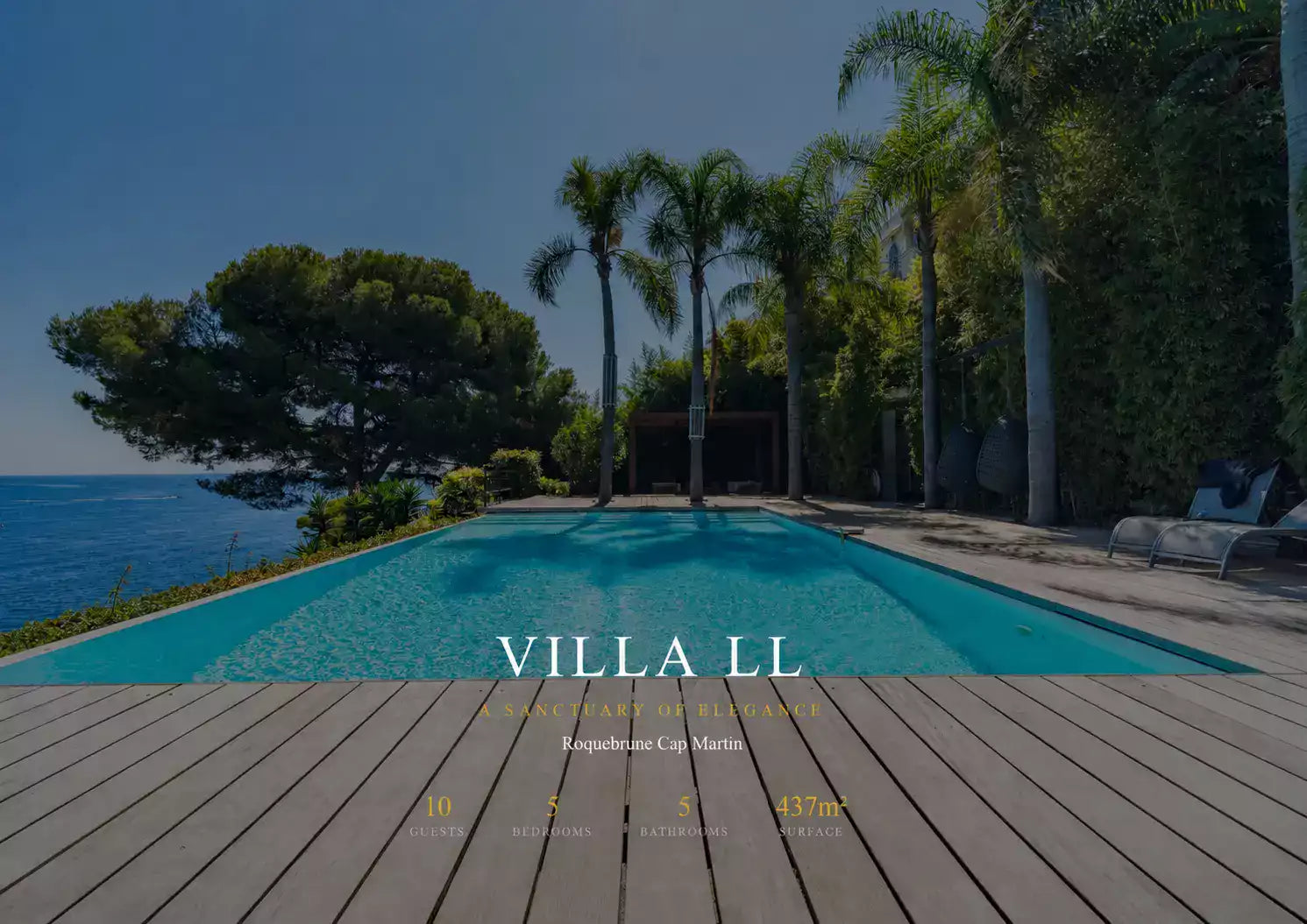 Villa LL with a pool and ocean view, featuring palm trees and wooden deck.