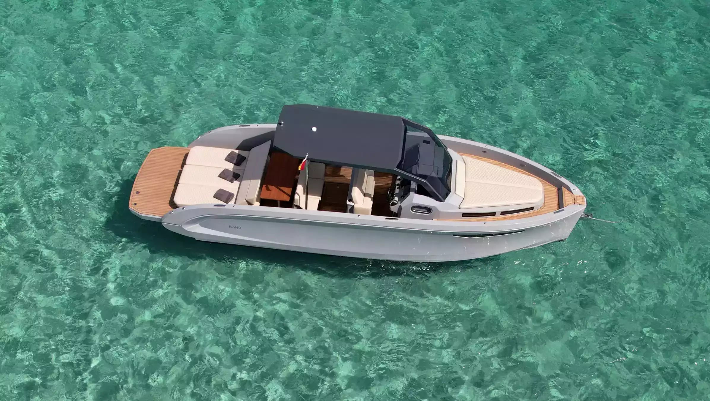 Luxury yacht on clear turquoise water