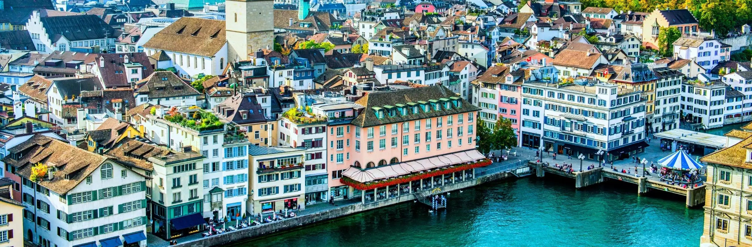 Cityscape with colorful buildings along a river